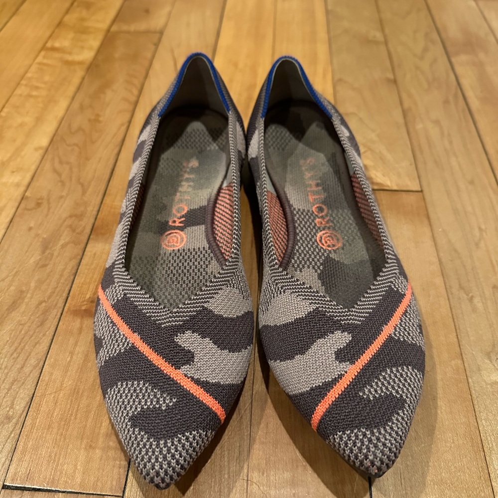 Rothy's Black and Orange Flats with Sporty Design